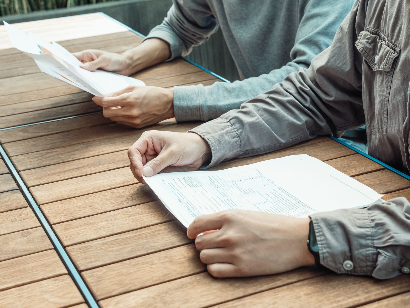 A person organising work-related receipts for a tax claim